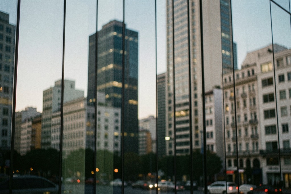 Financial district buildings reflected in a Buenos Aires glass facade