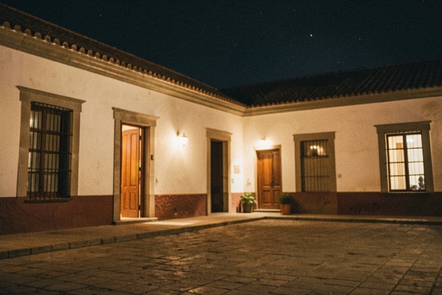 Illuminated historic colonial building in Tucumán at night