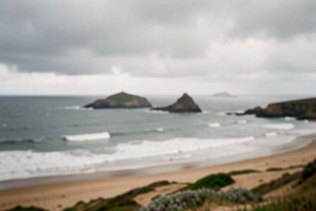 Rocky South Atlantic shoreline under grey skies